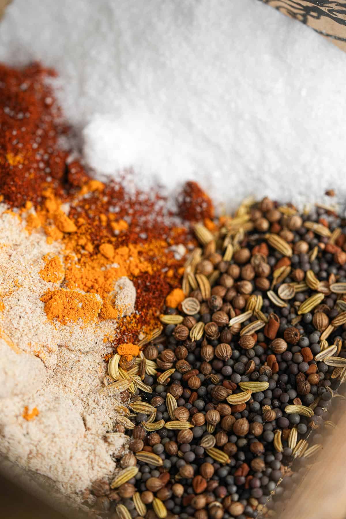 Spices and seasonings in a blender pitcher.