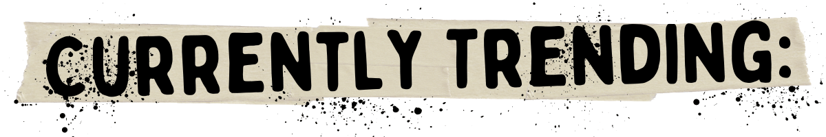 A grunge-style banner with the text "CURRENTLY TRENDING: Vegan Recipes" written in bold, black letters on a distressed beige background with black paint splatters.