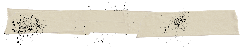 A strip of beige tape with an uneven, torn appearance, splattered with small black ink spots.