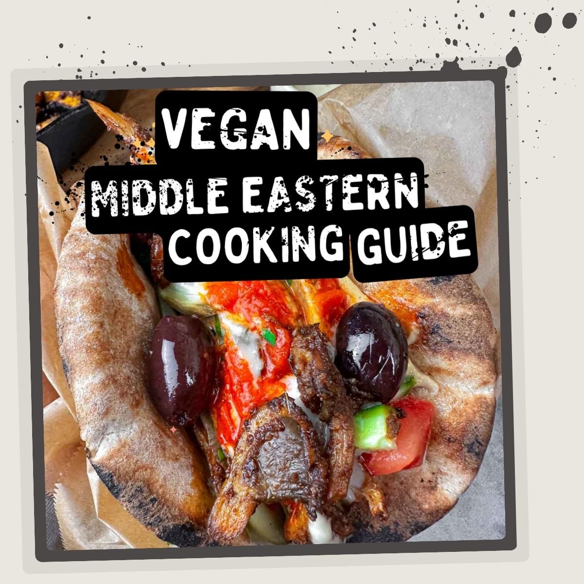 A pita stuffed with vegetables and olives. Overlay text reads: "Vegan Middle Eastern Cooking Guide.